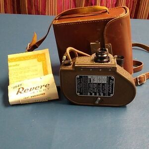 Revere Eight Model 88 Movie Camera 1940s 8 mm Case Book in bottom crushed